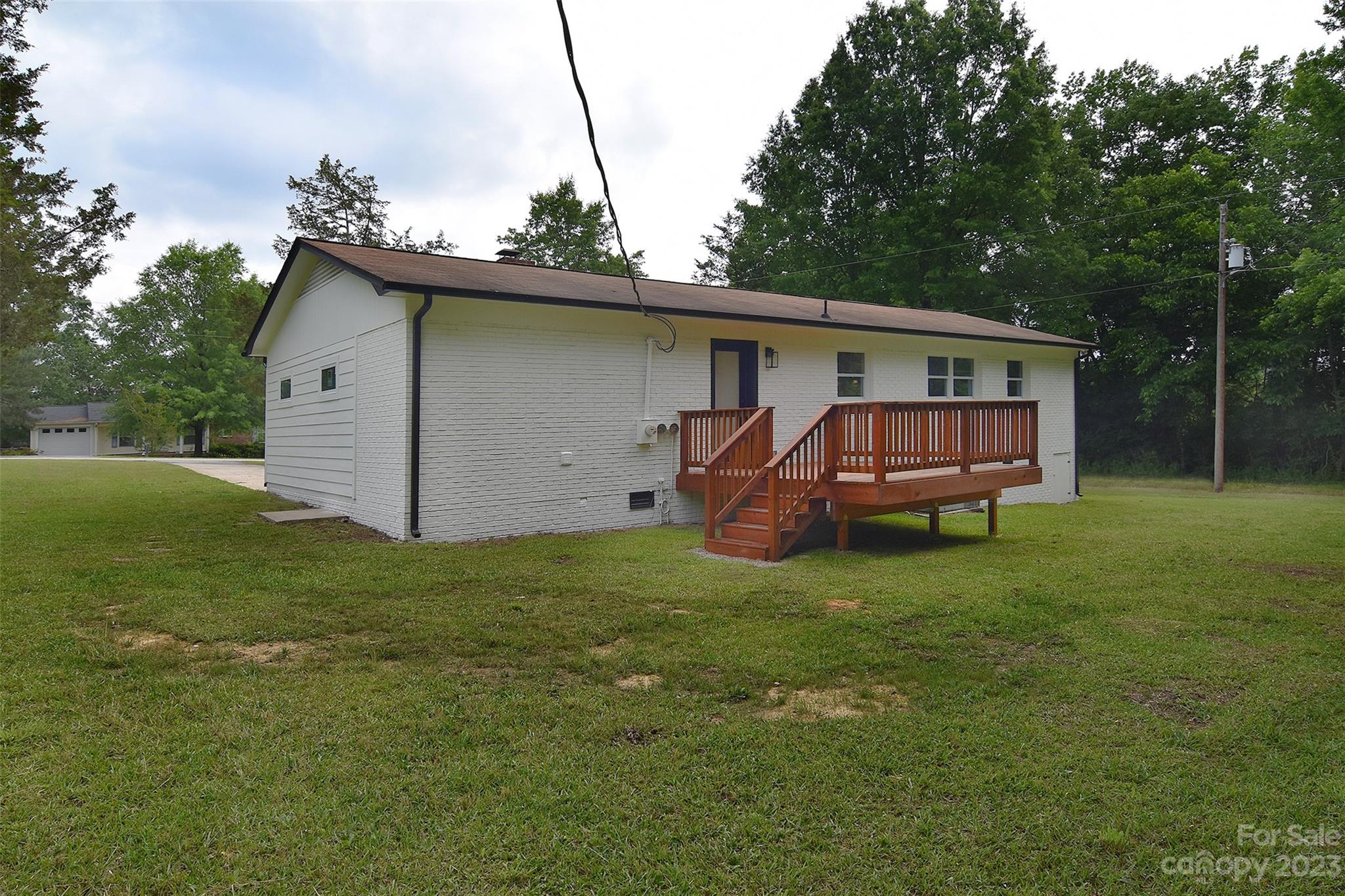 838 Culdesac Road Lancaster, SC 29720 - Photo 27 of 30 a backyard of a house with barbeque oven and barbeque oven
