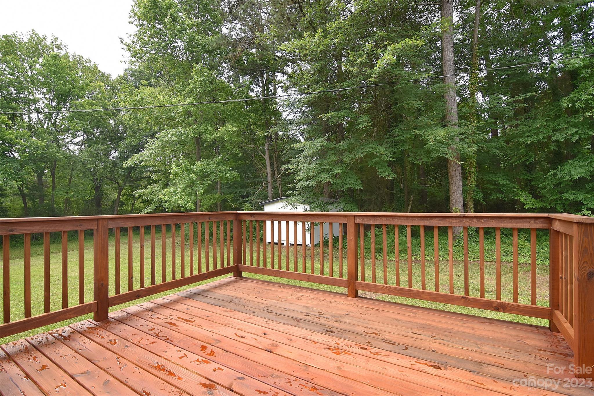 838 Culdesac Road Lancaster, SC 29720 - Photo 28 of 30 a view of balcony with wooden floor and fence