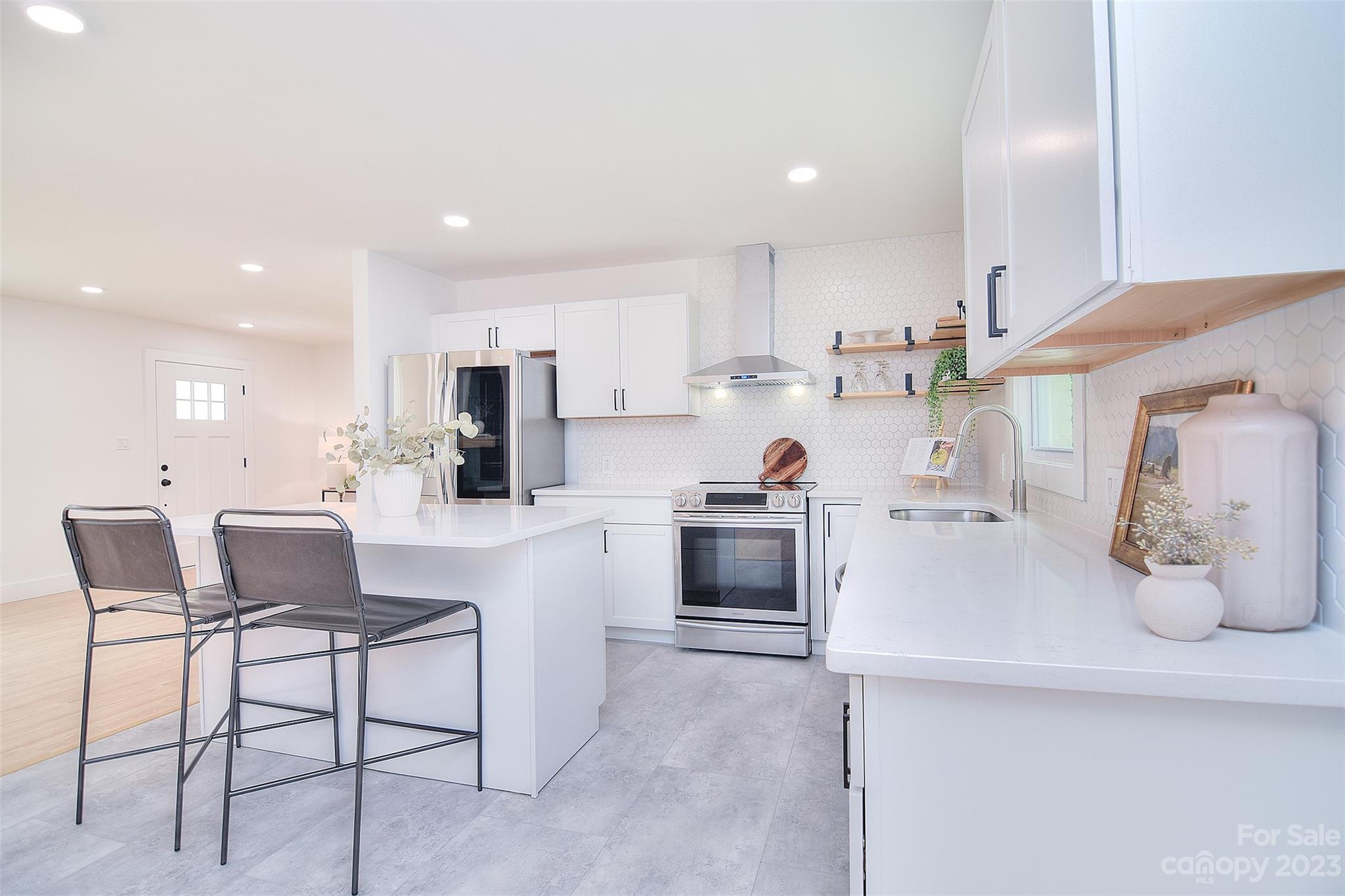 838 Culdesac Road Lancaster, SC 29720 - Photo 8 of 30 a kitchen with a sink cabinets and window