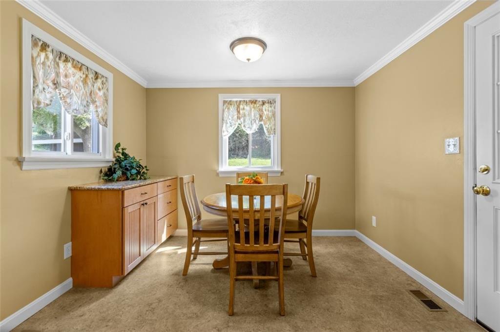 21 Ryan Drive Pittsburgh, PA 15220 - Photo 13 of 28 a view of a dining room with furniture window and outside view