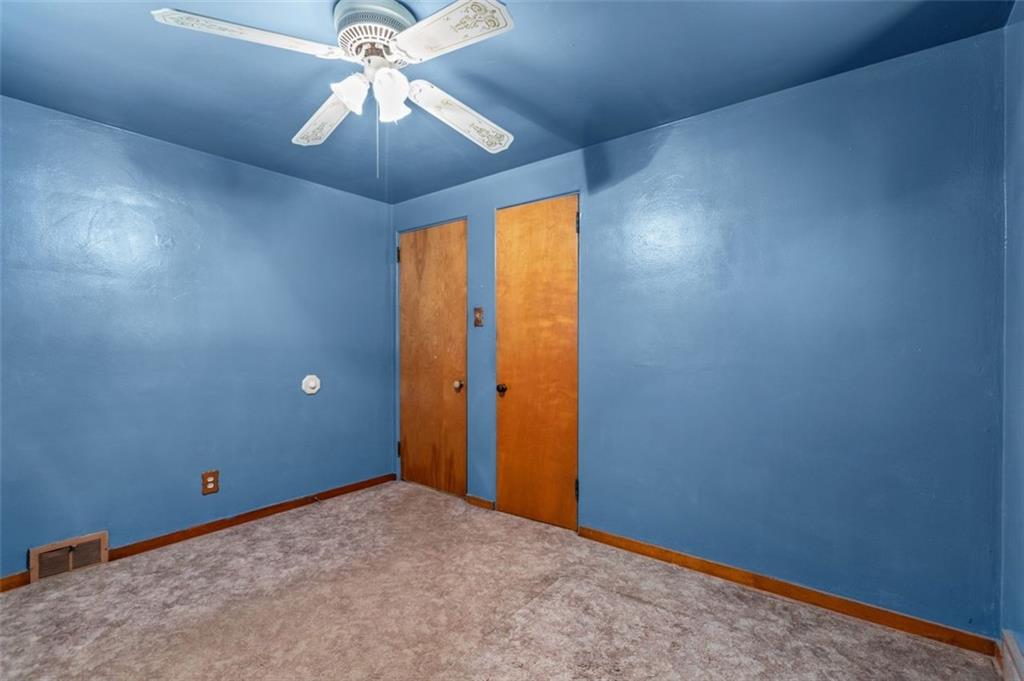 21 Ryan Drive Pittsburgh, PA 15220 - Photo 22 of 28 a view of an empty room and chandelier fan
