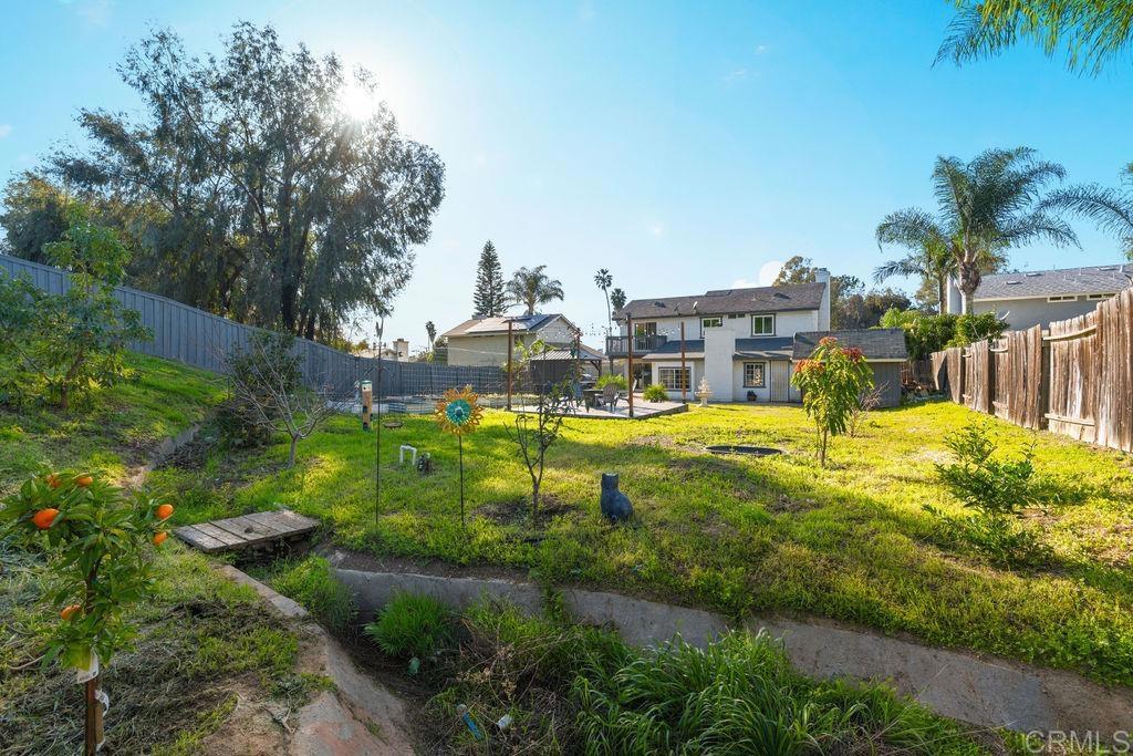 5322 Leon Street Oceanside, CA 92057 - Photo 53 of 73 a view of a swimming pool with a fountain and plants