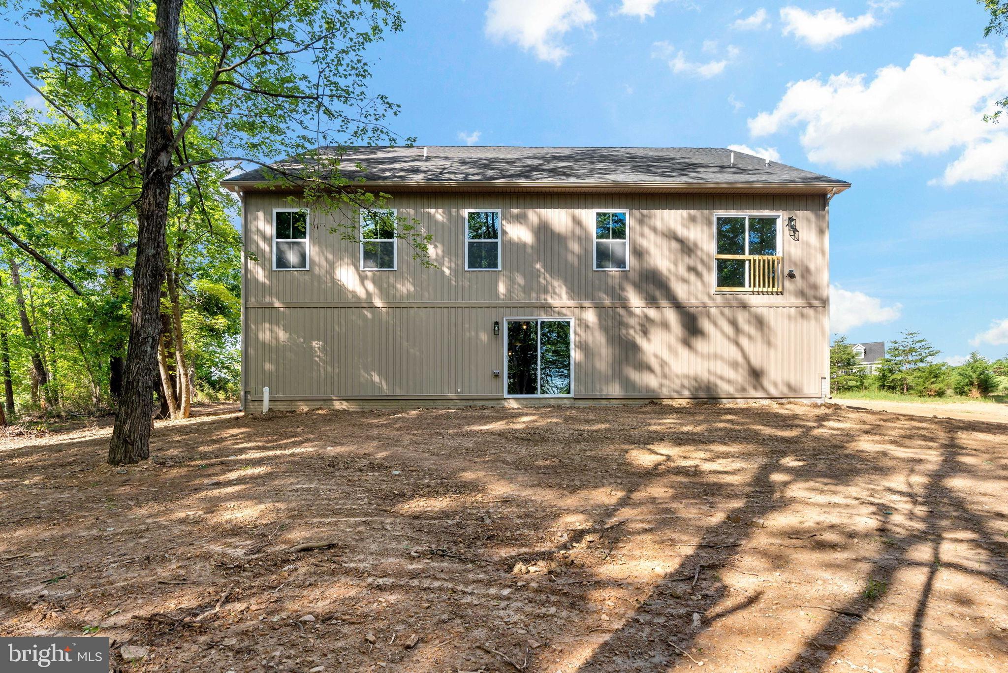 2 Libby's Ridge Road Berkeley Springs, WV 25411 - Photo 35 of 35 a front view of a house with a yard