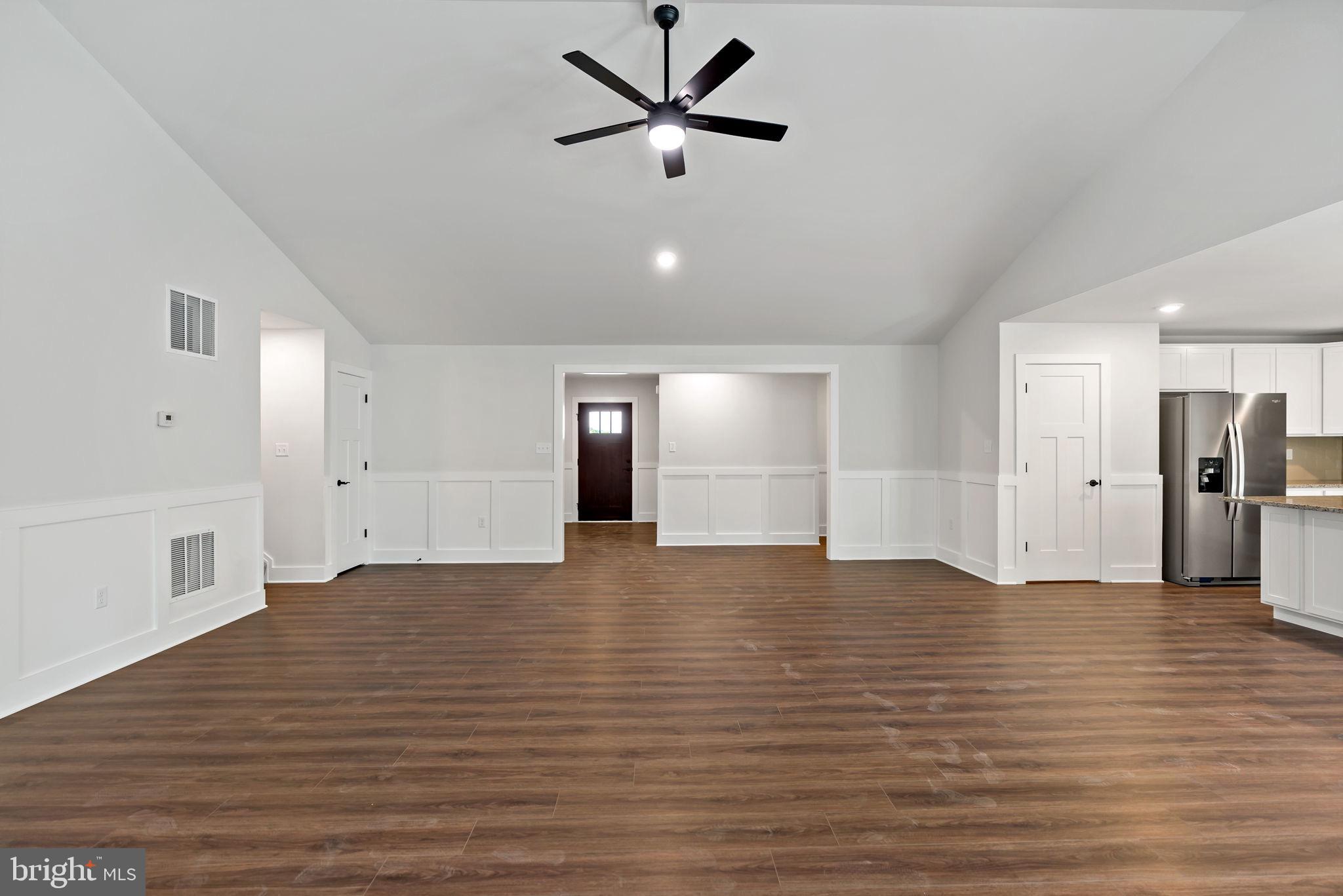 2 Libby's Ridge Road Berkeley Springs, WV 25411 - Photo 7 of 35 a view of empty room with wooden floor and ceiling fan