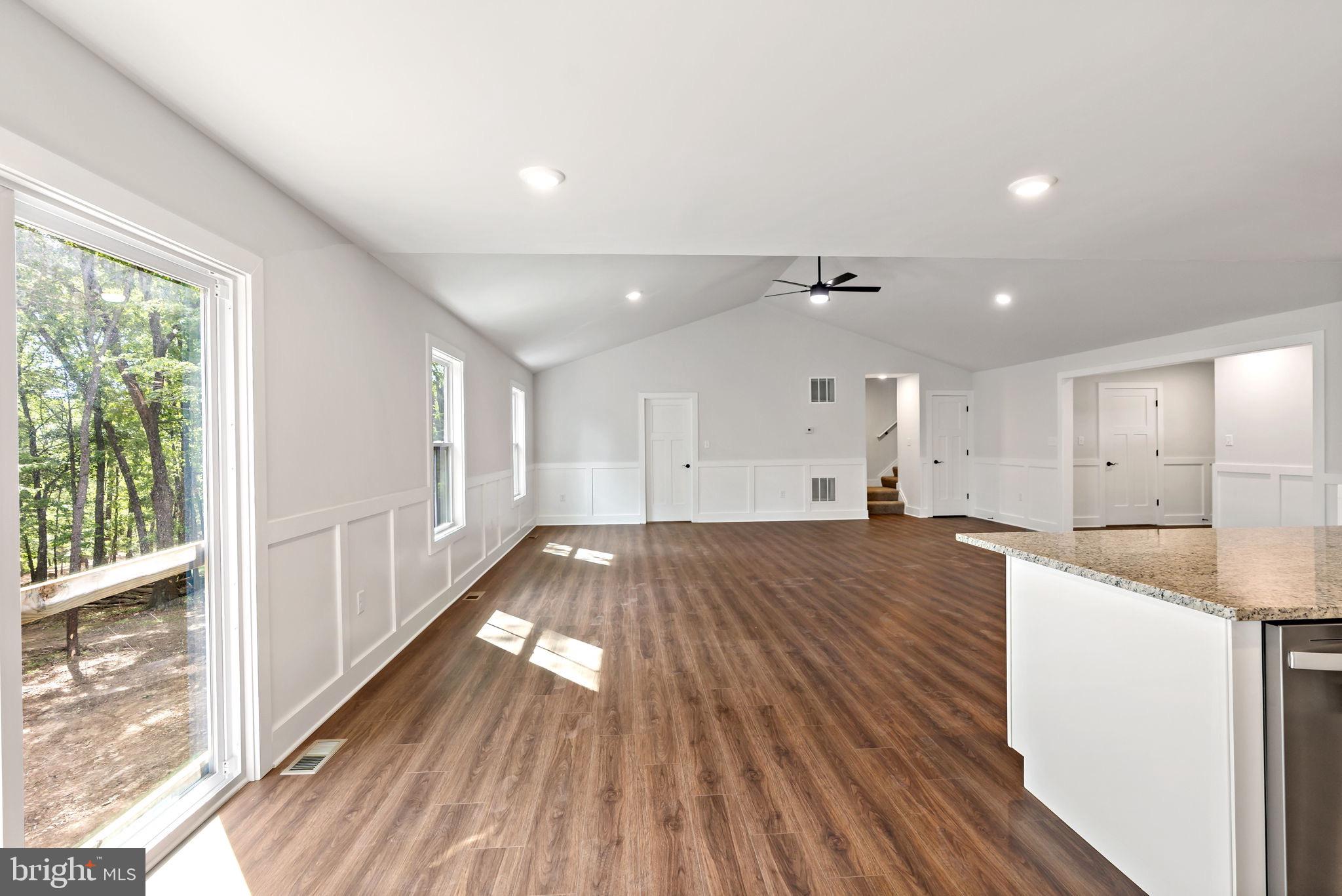 2 Libby's Ridge Road Berkeley Springs, WV 25411 - Photo 10 of 35 a view of a living room hardwood floor and a kitchen