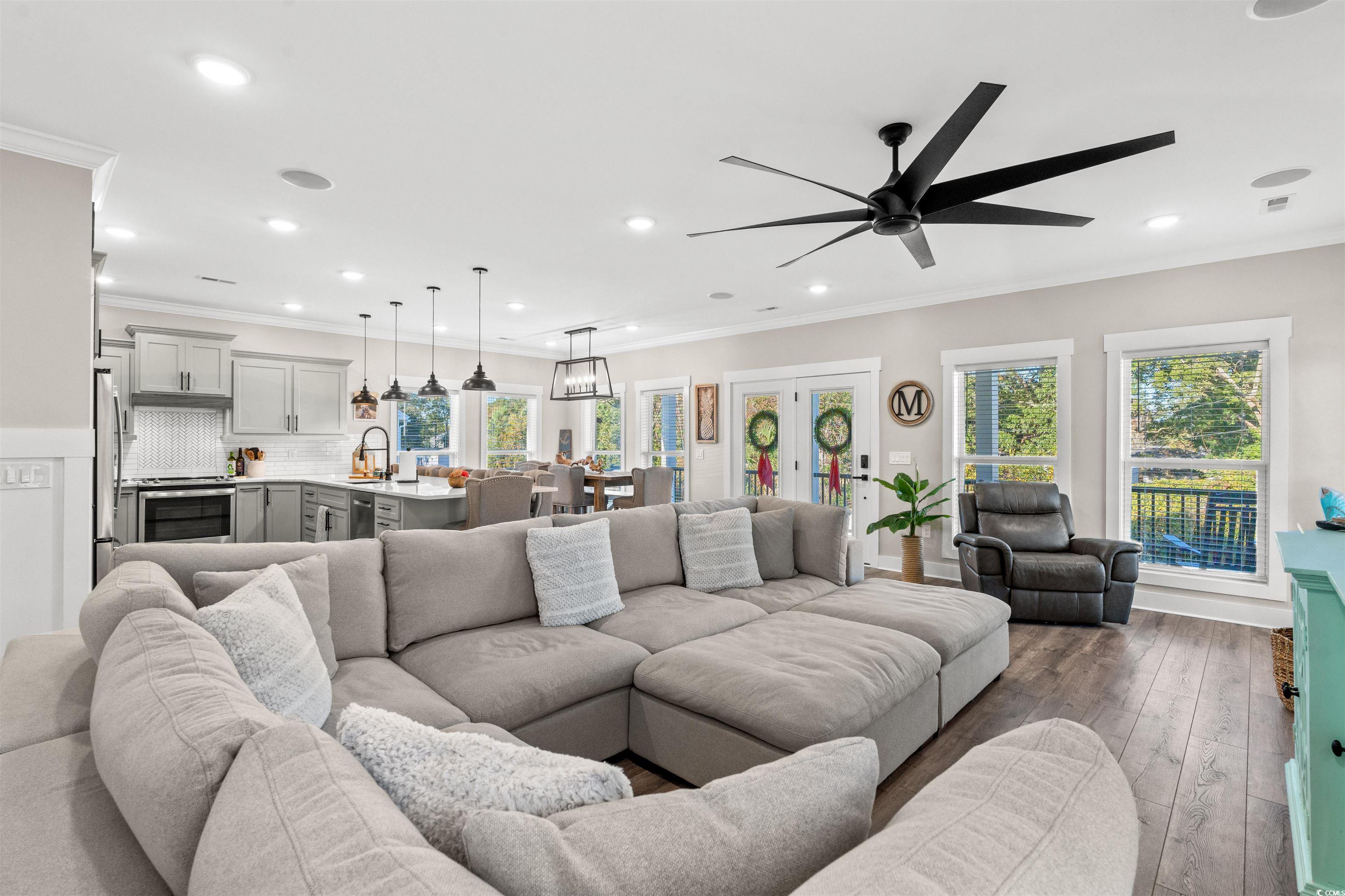 355 Oak Avenue Murrells Inlet, SC 29576 - Photo 10 of 34 Living area featuring recessed lighting, crown molding, a wealth of natural light, and a ceiling fan
