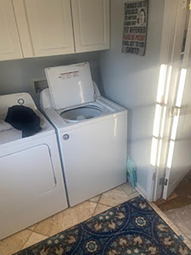 19818 Deep Springs Road Fountain, FL 32438 - Photo 16 of 21 a utility room with dryer and washer