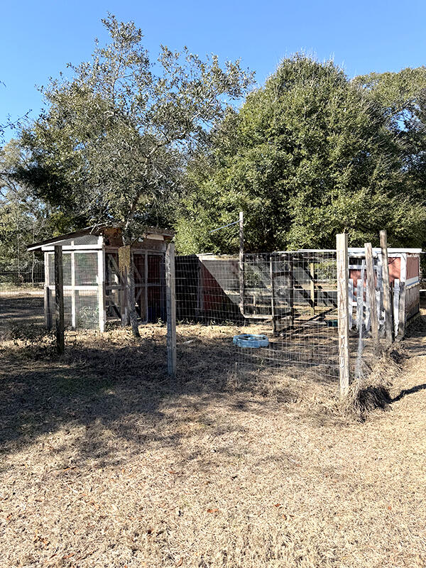 19818 Deep Springs Road Fountain, FL 32438 - Photo 18 of 21 a view of a house with a yard