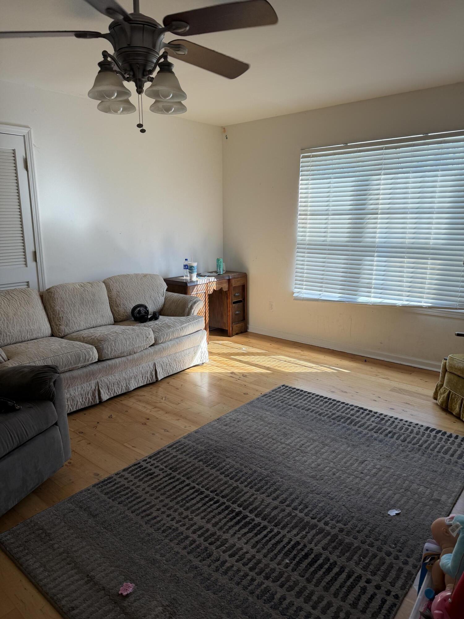 19818 Deep Springs Road Fountain, FL 32438 - Photo 10 of 21 a living room with furniture and a window