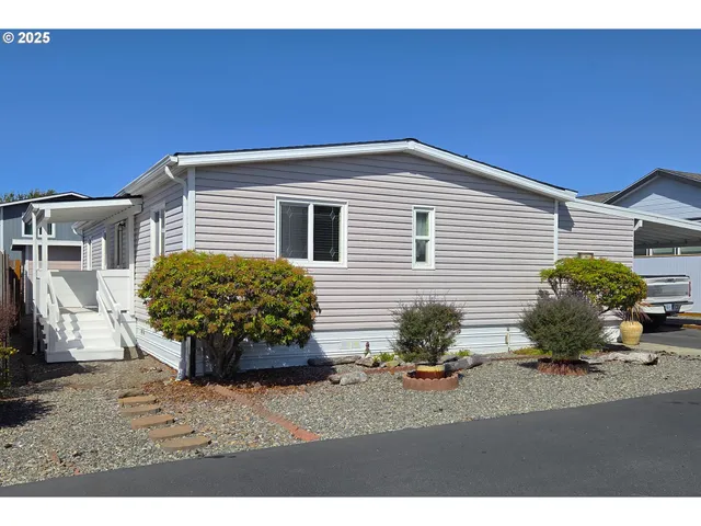 a view of a backyard with plants