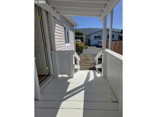 a house view with a garden space