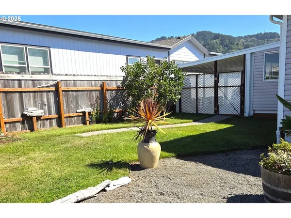 a house view with a garden space