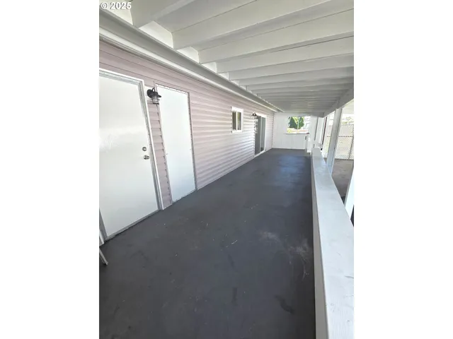 a view of a hallway with window