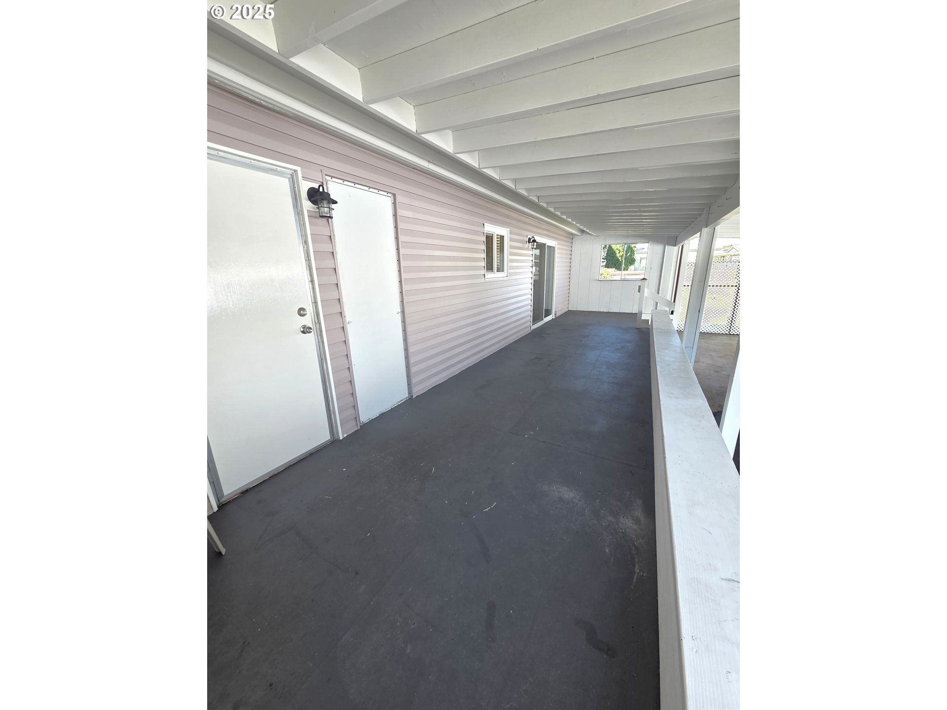 15889 Sunset Strip, Unit 102 Brookings, OR 97415 - Photo 6 of 27 a view of a hallway with window