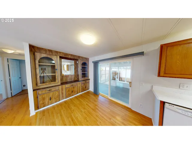 a bathroom with a sink and a large mirror