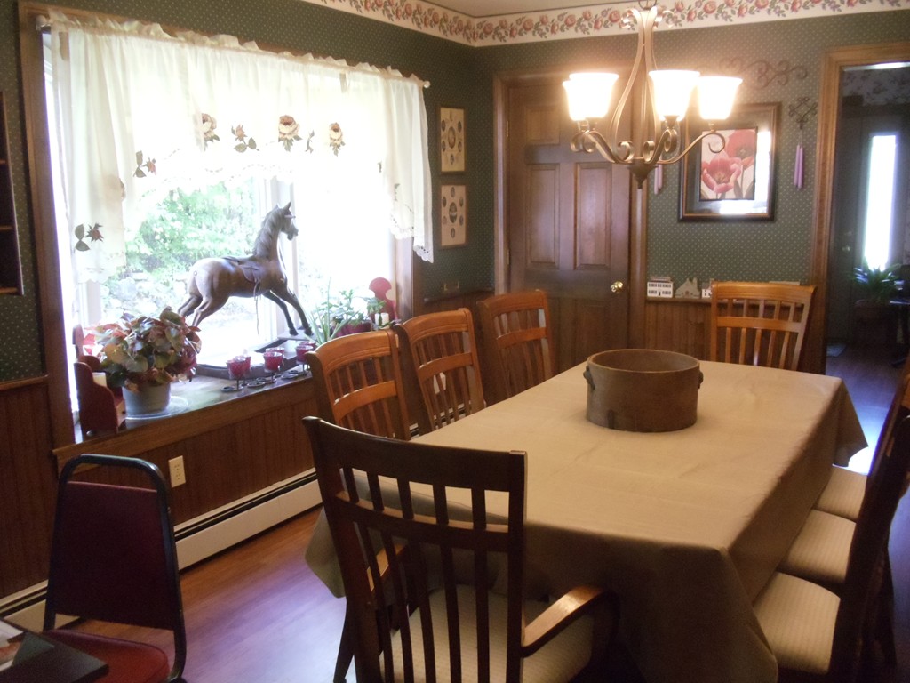 270 Lower Road Hardwick, MA 01031 - Photo 5 of 16 a view of a dining room with furniture and wooden floor