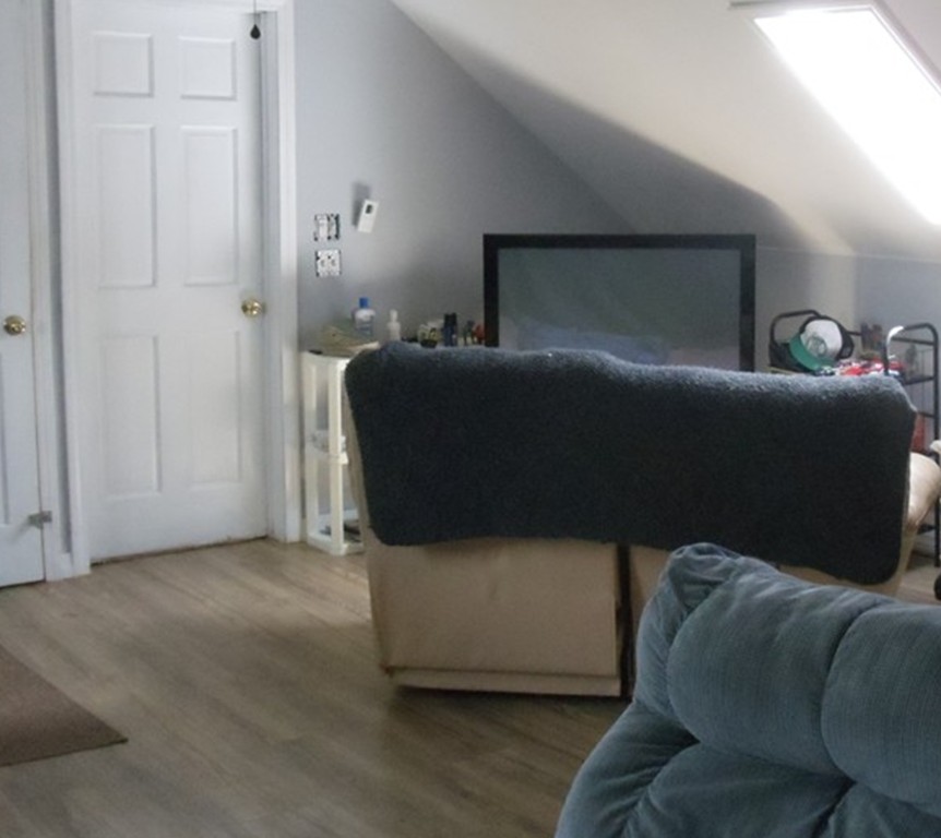 270 Lower Road Hardwick, MA 01031 - Photo 9 of 16 a living room with furniture and a lamp