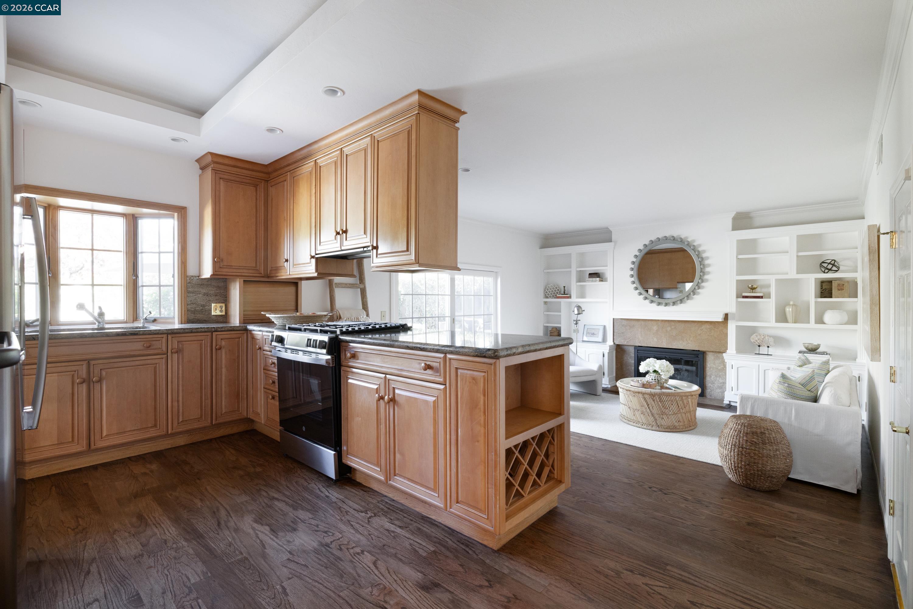 902 Kane Circle Walnut Creek, CA 94598 - Photo 12 of 40 a kitchen with stainless steel appliances granite countertop a stove and a refrigerator