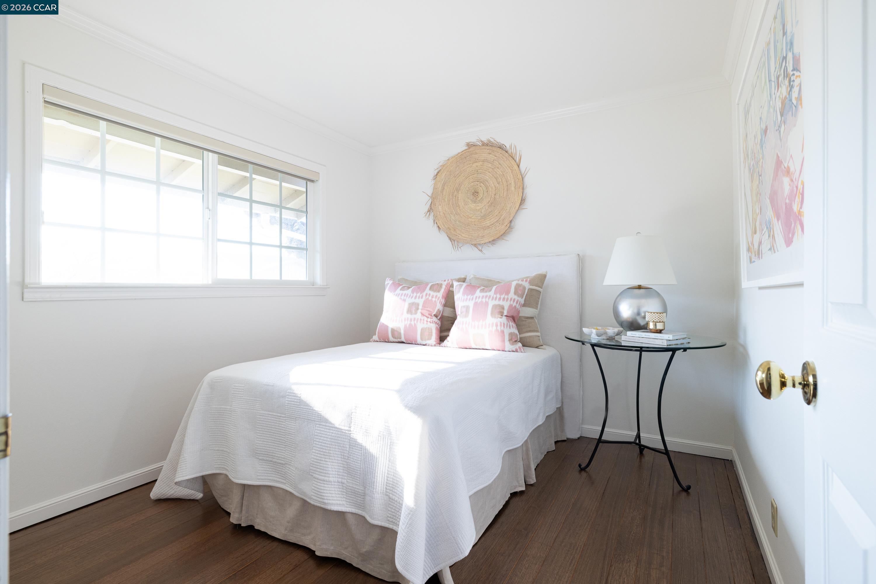 902 Kane Circle Walnut Creek, CA 94598 - Photo 26 of 40 a bedroom with a bed and window