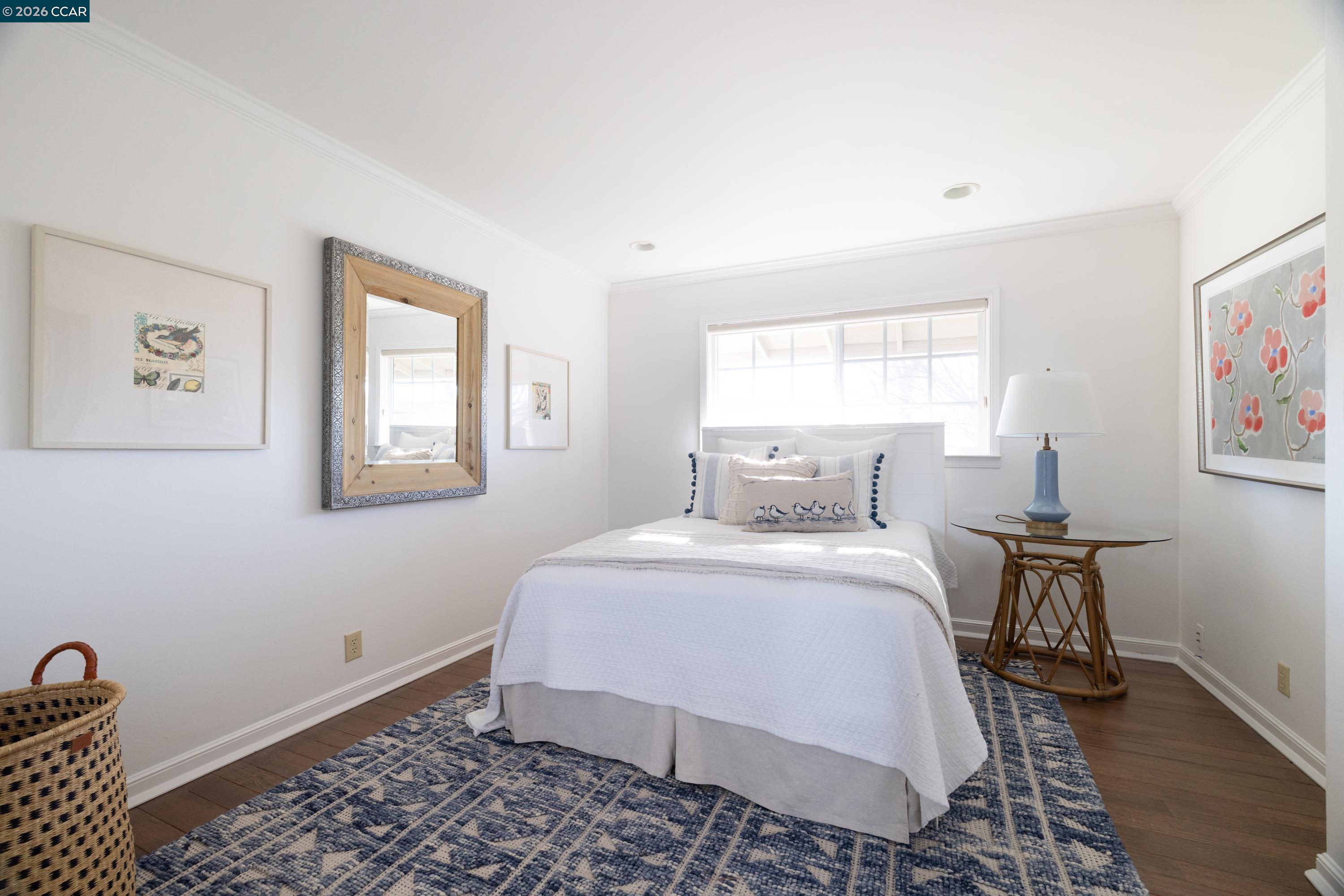 902 Kane Circle Walnut Creek, CA 94598 - Photo 28 of 40 a bedroom with a bed and wooden floor