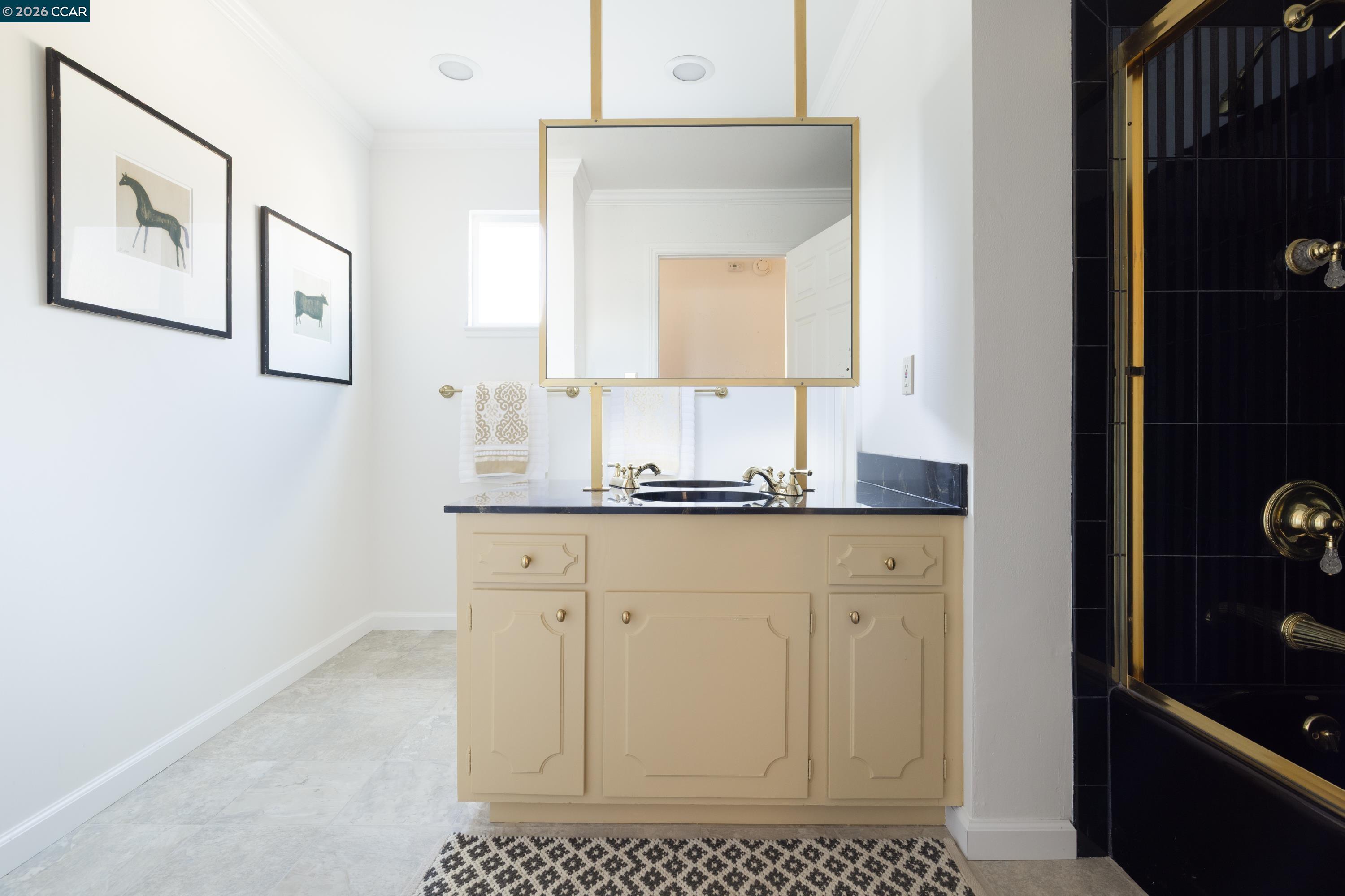 902 Kane Circle Walnut Creek, CA 94598 - Photo 29 of 40 a bathroom with a sink and a mirror