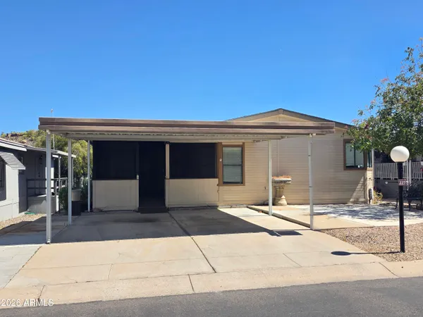 a front view of a house with yard