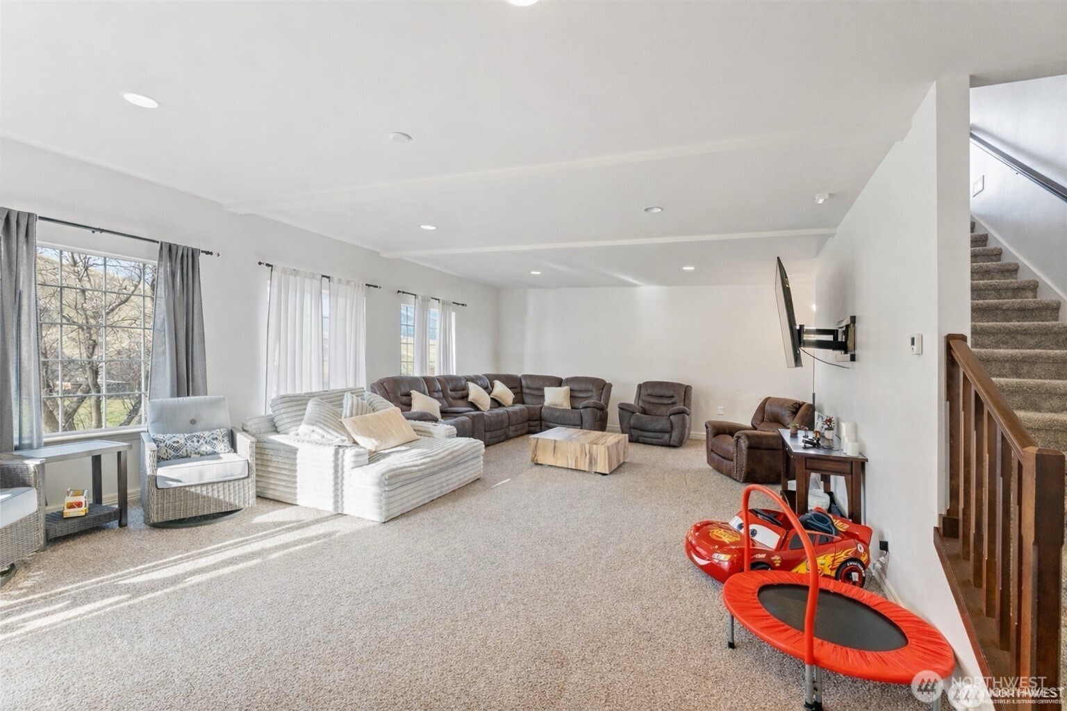 1918 Broadview Wenatchee, WA 98801 - Photo 15 of 38 a living room with furniture a window and gym equipment