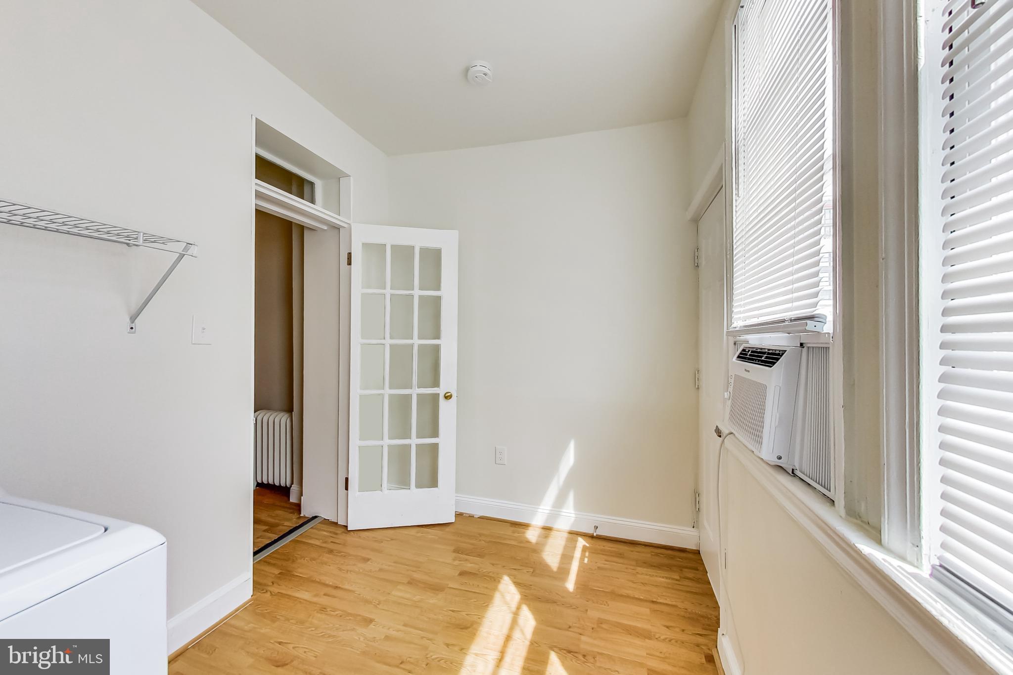 137 R Street Northeast Washington, DC 20002 - Photo 15 of 28 a view of an empty room with a window