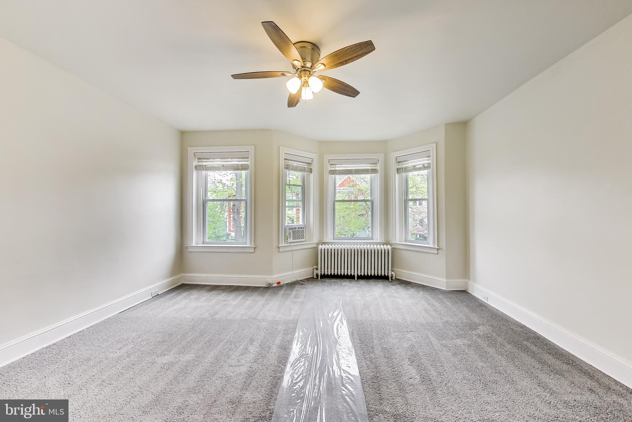 137 R Street Northeast Washington, DC 20002 - Photo 18 of 28 a view of an empty room with a window