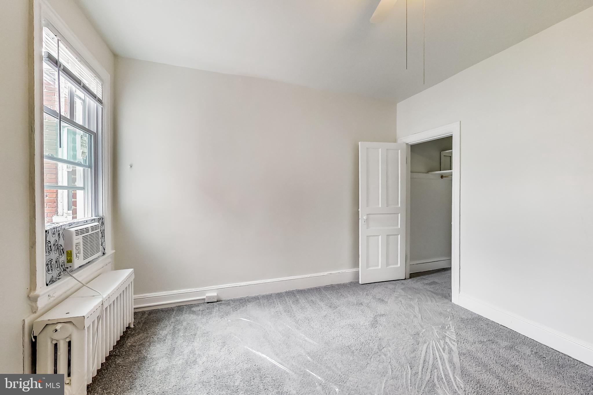 137 R Street Northeast Washington, DC 20002 - Photo 21 of 28 a view of an empty room with a window