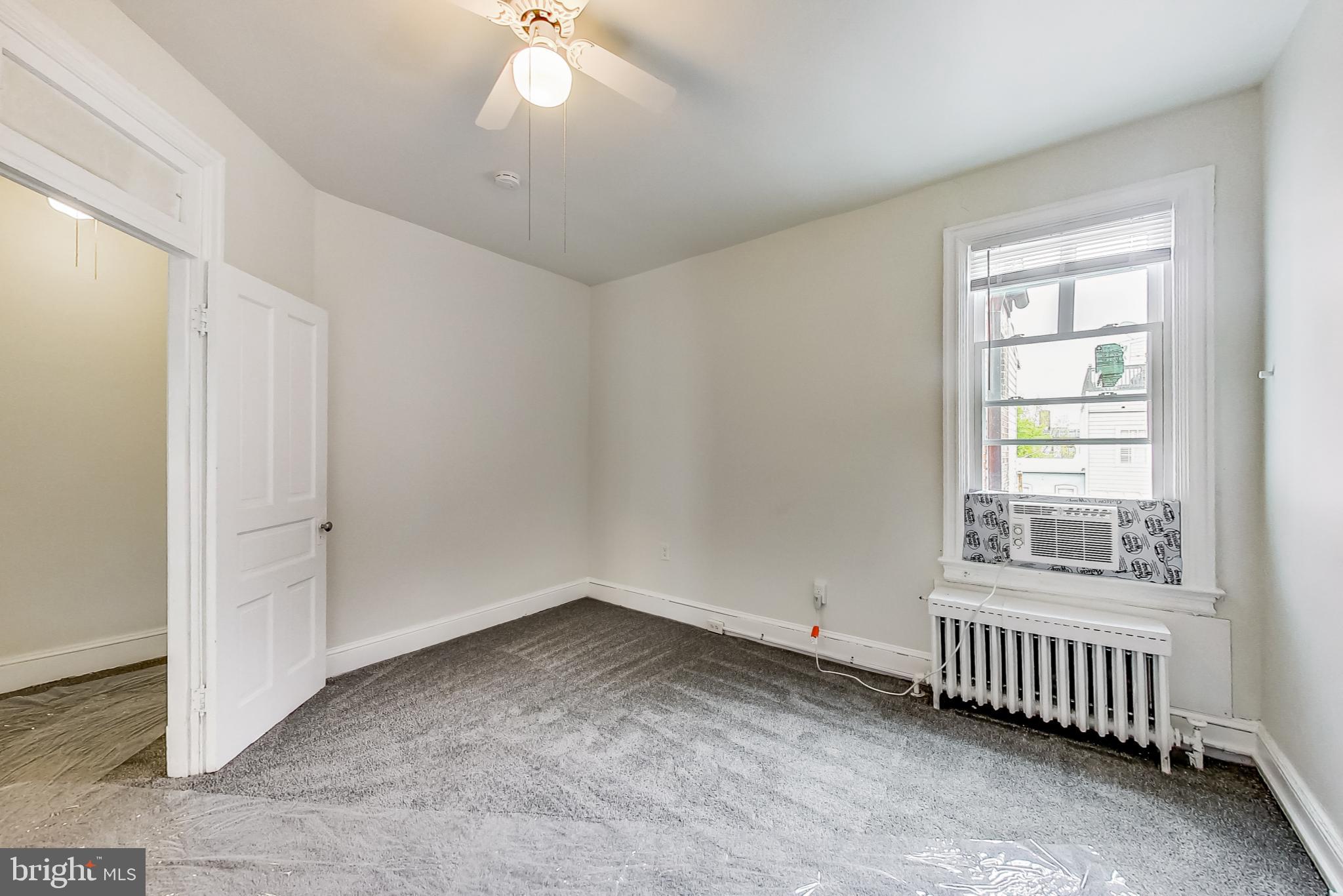 137 R Street Northeast Washington, DC 20002 - Photo 22 of 28 an empty room with a window