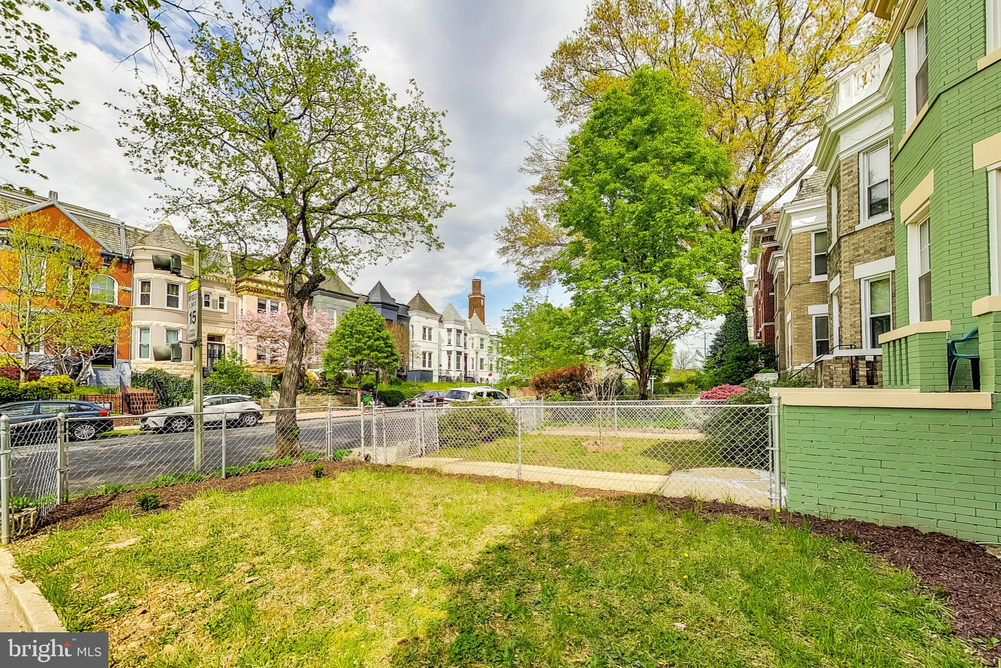 137 R Street Northeast Washington, DC 20002 - Photo 3 of 28 a view of a swimming pool with a lawn chairs