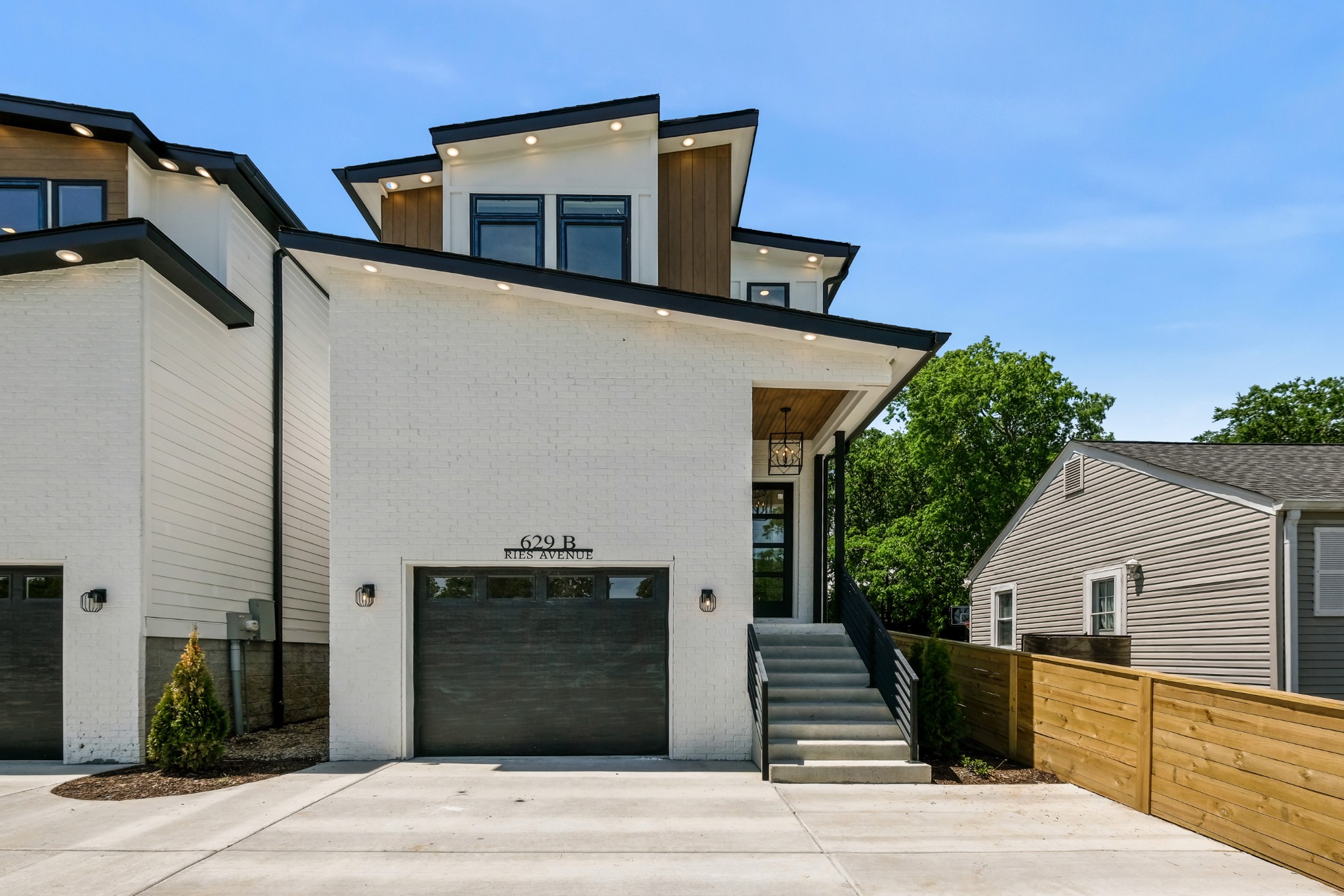 629 B Ries Avenue Nashville, TN 37209 - Photo 1 of 62 a front view of a house with garage
