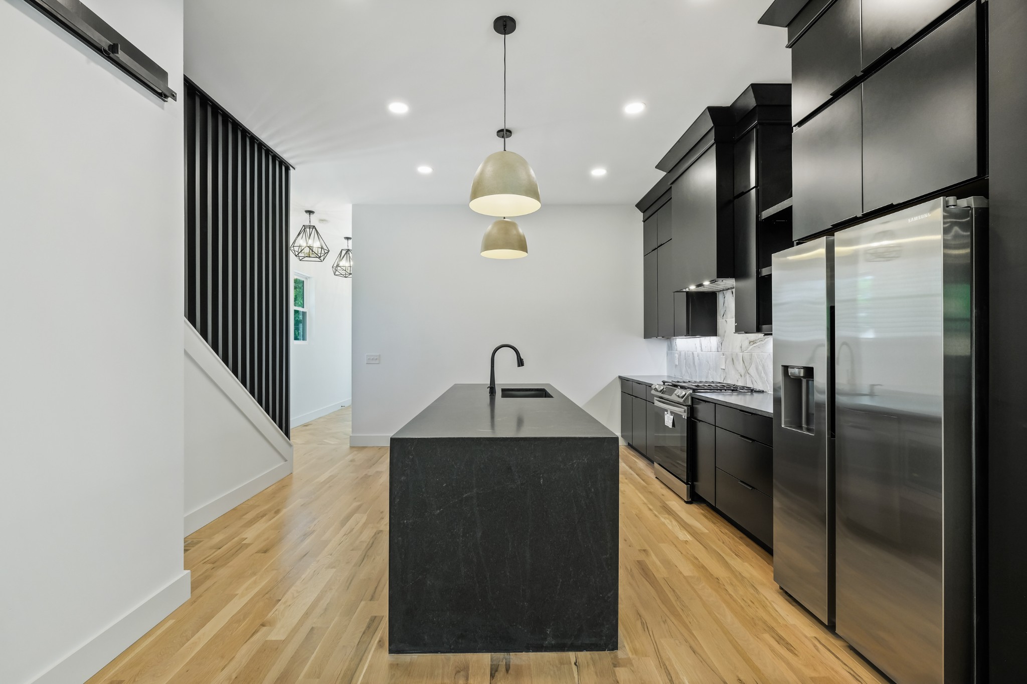 629 B Ries Avenue Nashville, TN 37209 - Photo 13 of 62 a kitchen with stainless steel appliances granite countertop a refrigerator a sink a stove and oven
