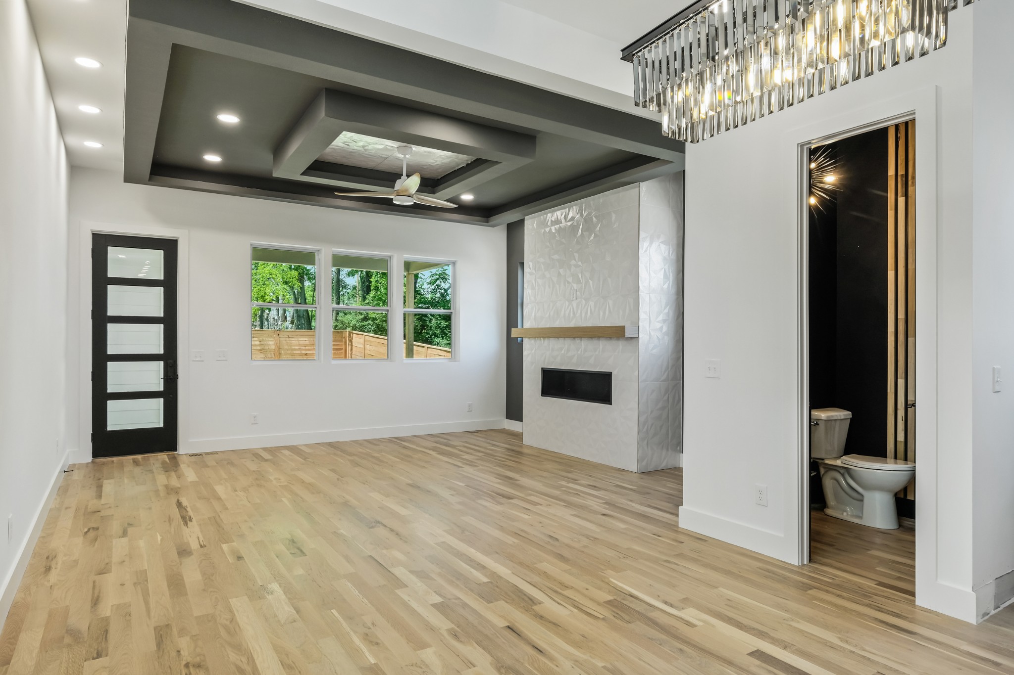 629 B Ries Avenue Nashville, TN 37209 - Photo 23 of 62 wooden floor in an empty room with a fireplace