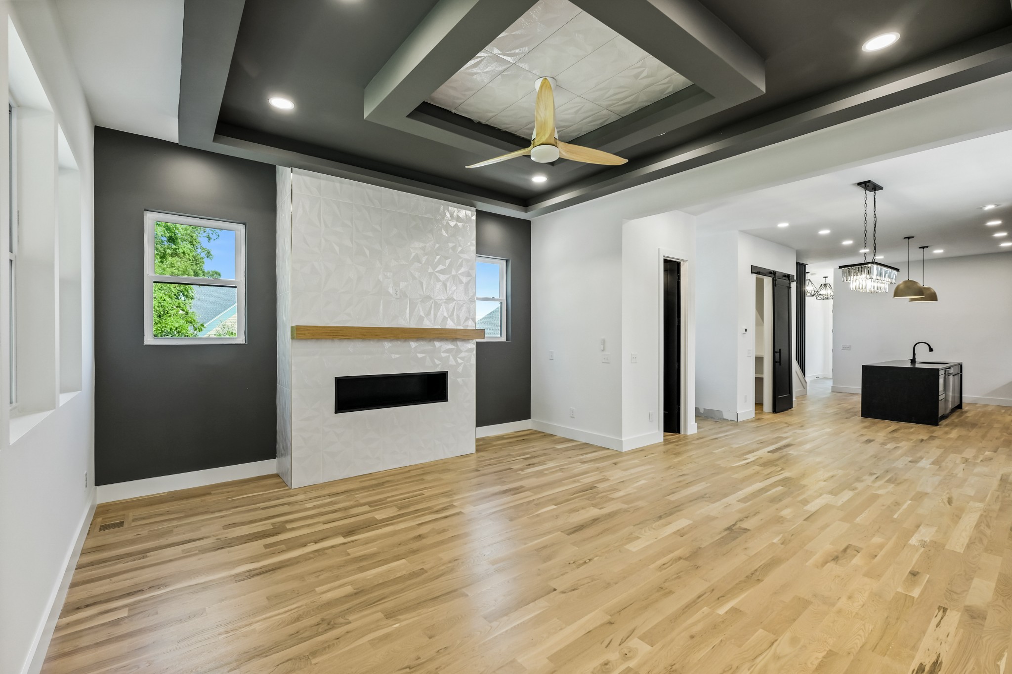 629 B Ries Avenue Nashville, TN 37209 - Photo 27 of 62 a view of a livingroom with a fireplace and a ceiling fan