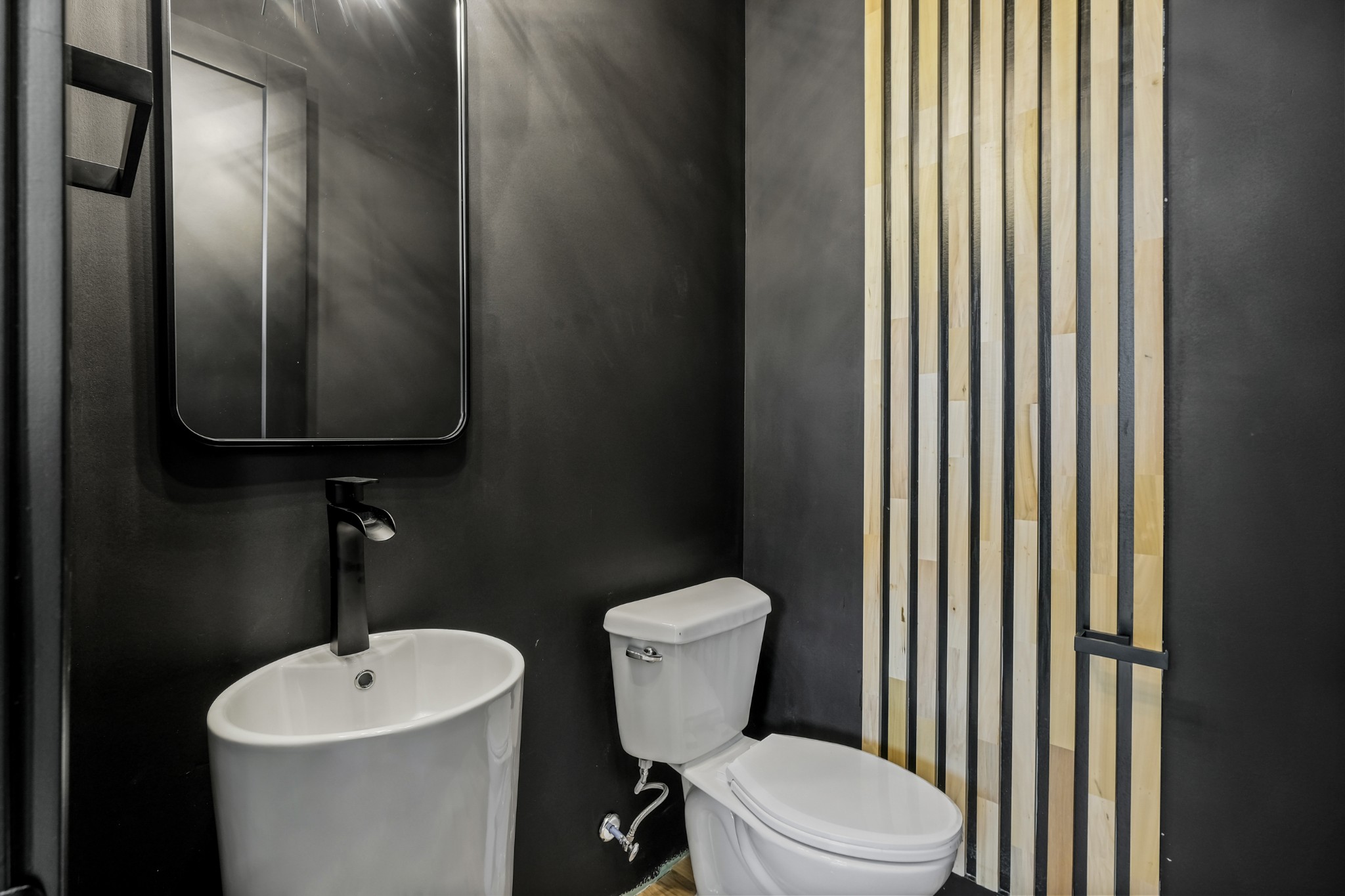 629 B Ries Avenue Nashville, TN 37209 - Photo 29 of 62 a bathroom with a toilet a sink and a mirror