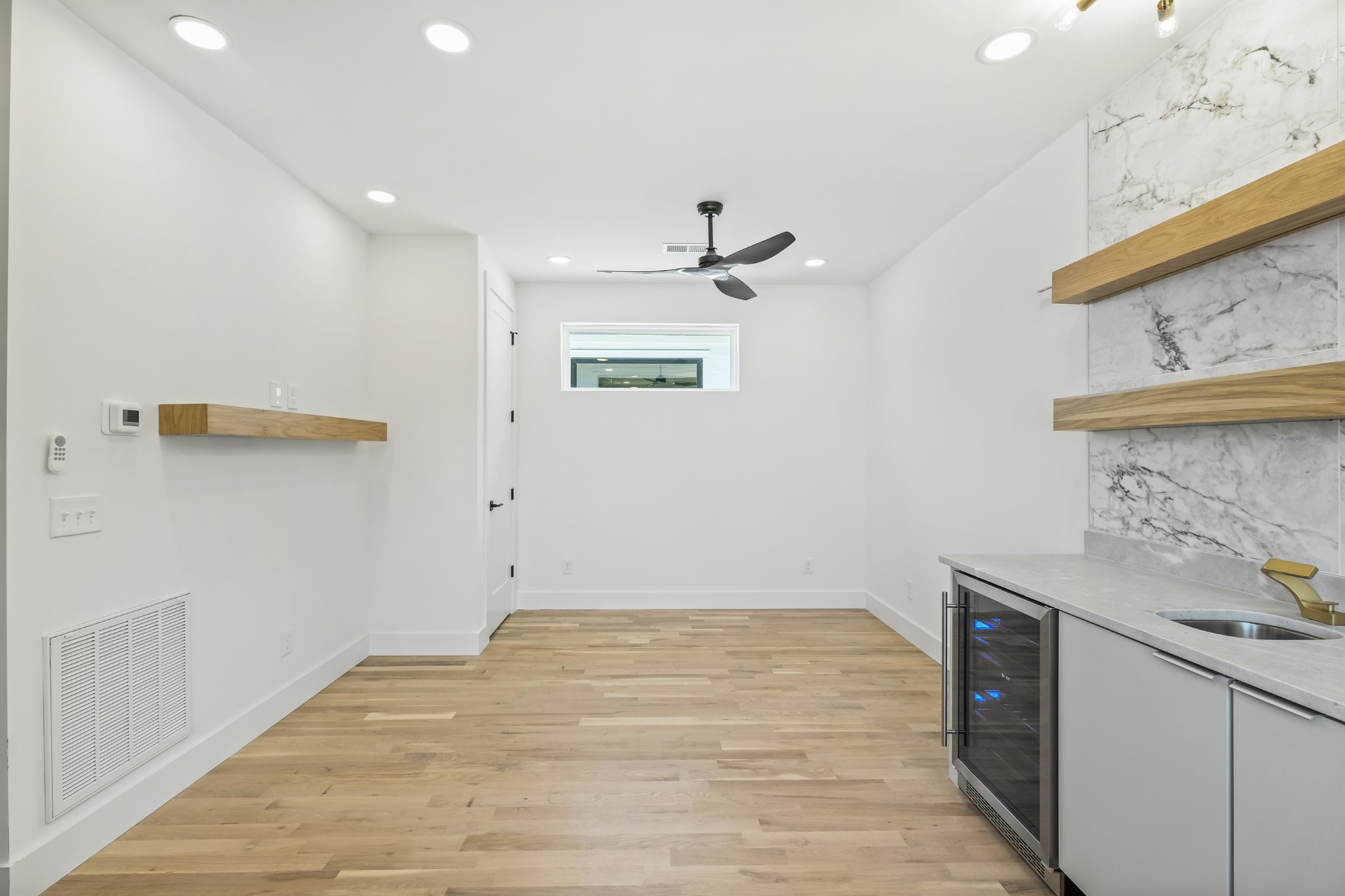 629 B Ries Avenue Nashville, TN 37209 - Photo 32 of 62 a view of a kitchen with a sink and a refrigerator