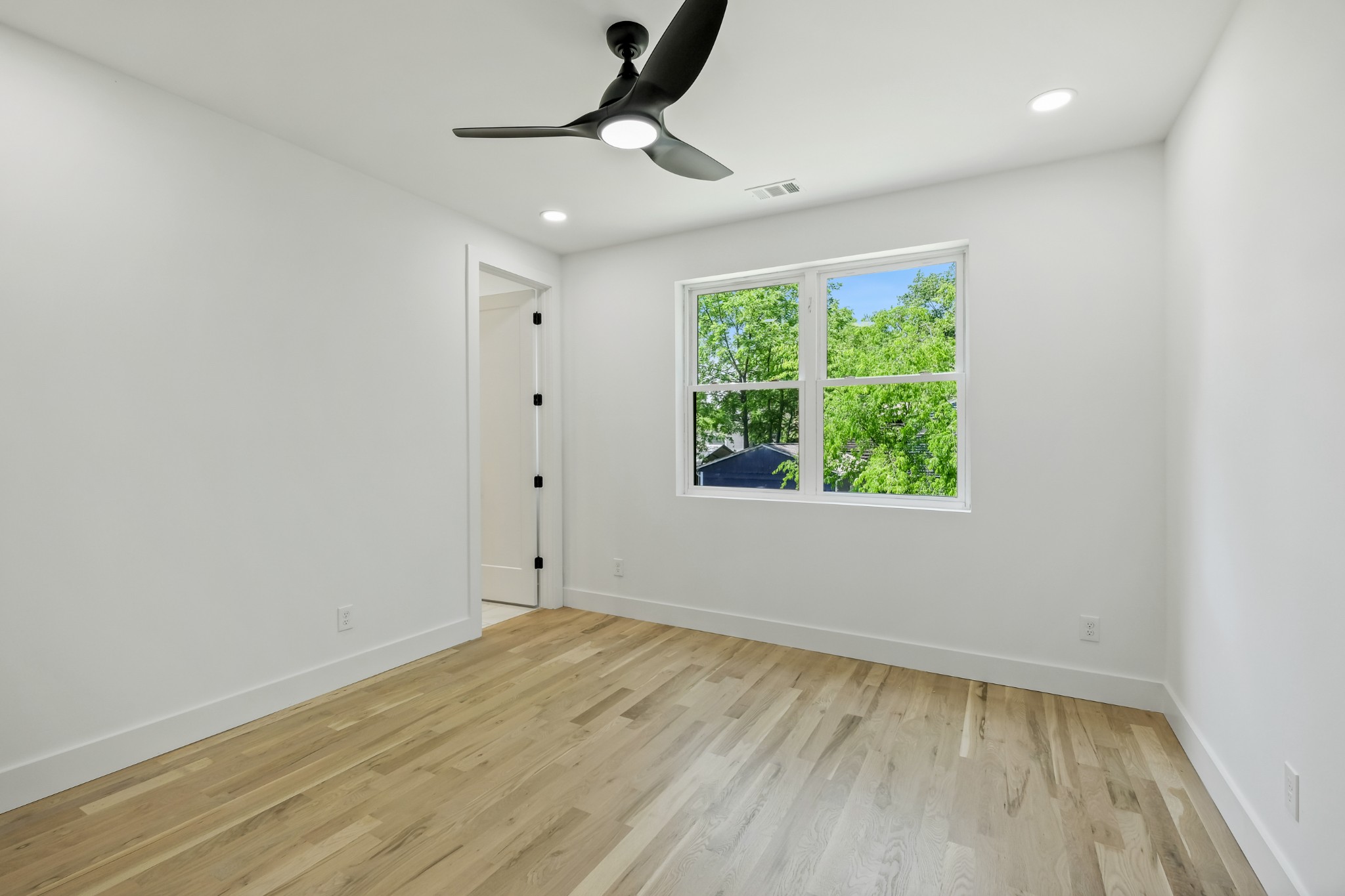 629 B Ries Avenue Nashville, TN 37209 - Photo 54 of 62 wooden floor in an empty room with a window