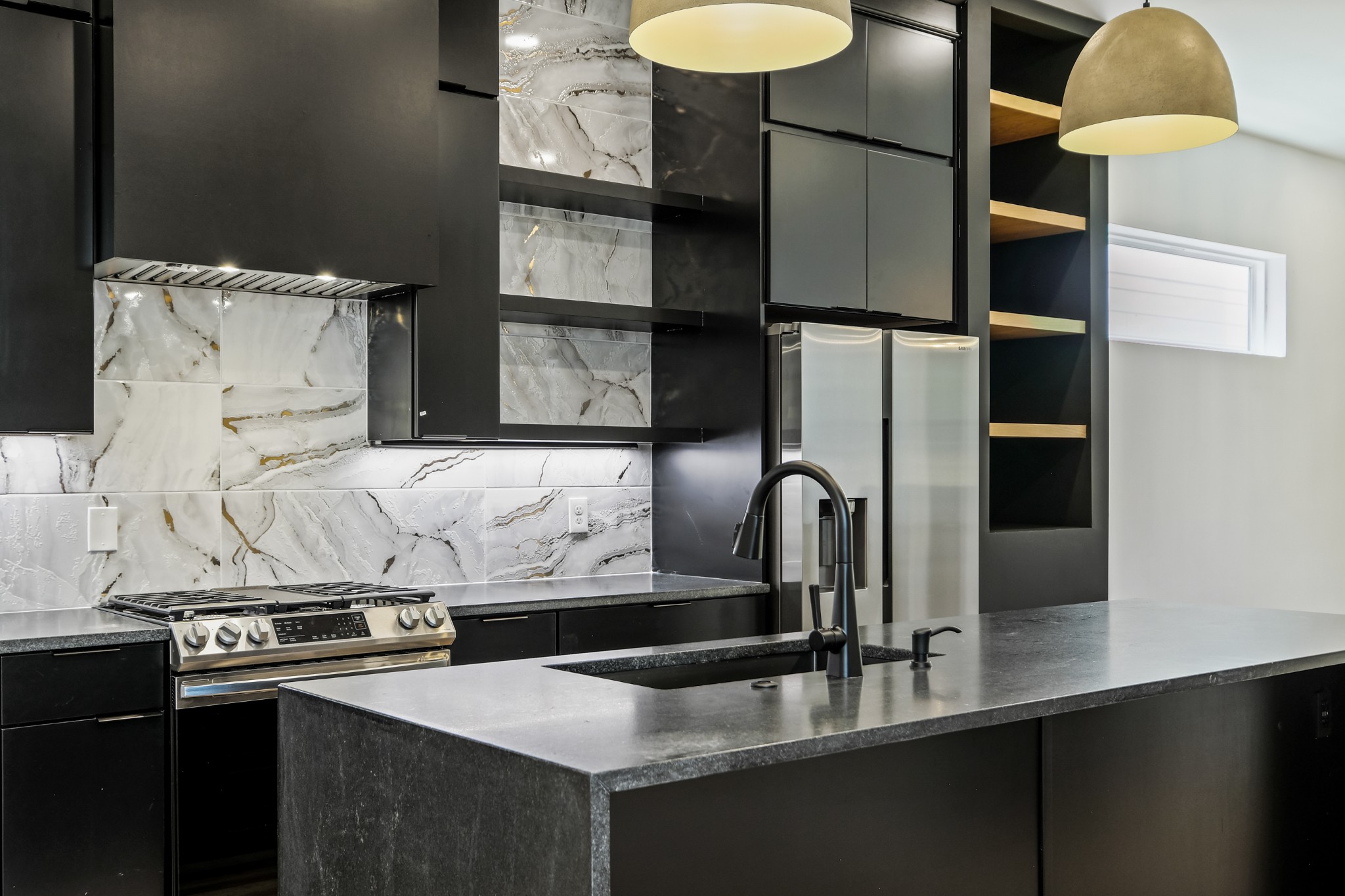 629 B Ries Avenue Nashville, TN 37209 - Photo 8 of 62 a kitchen with a sink and a refrigerator