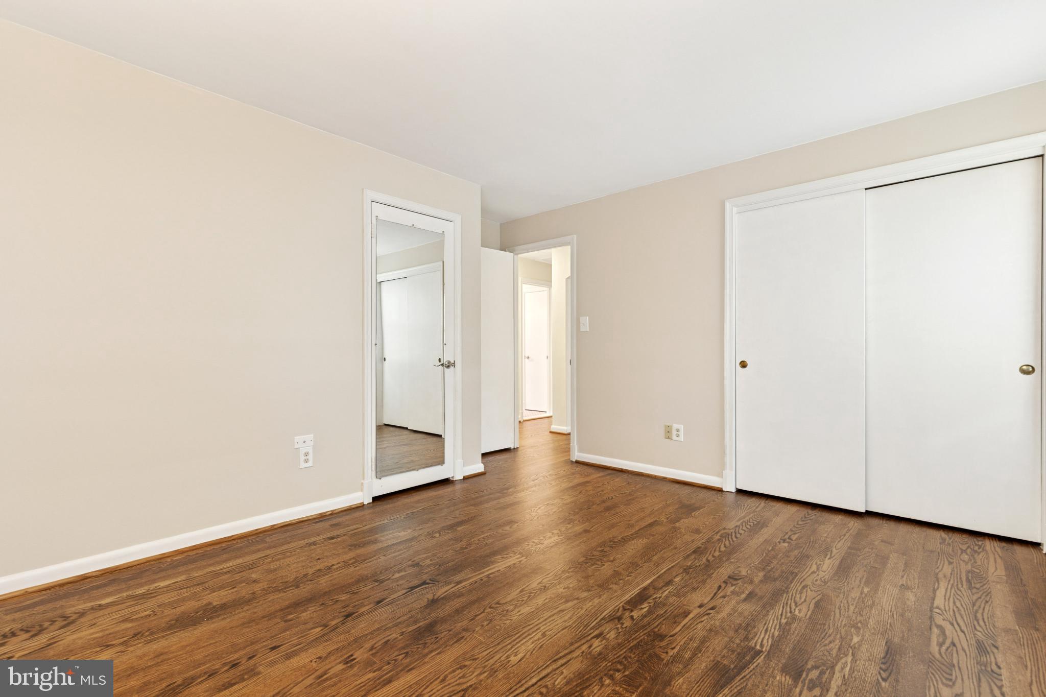 4009 High Point Road Ellicott City, MD 21042 - Photo 13 of 51 a view of an empty room with wooden floor