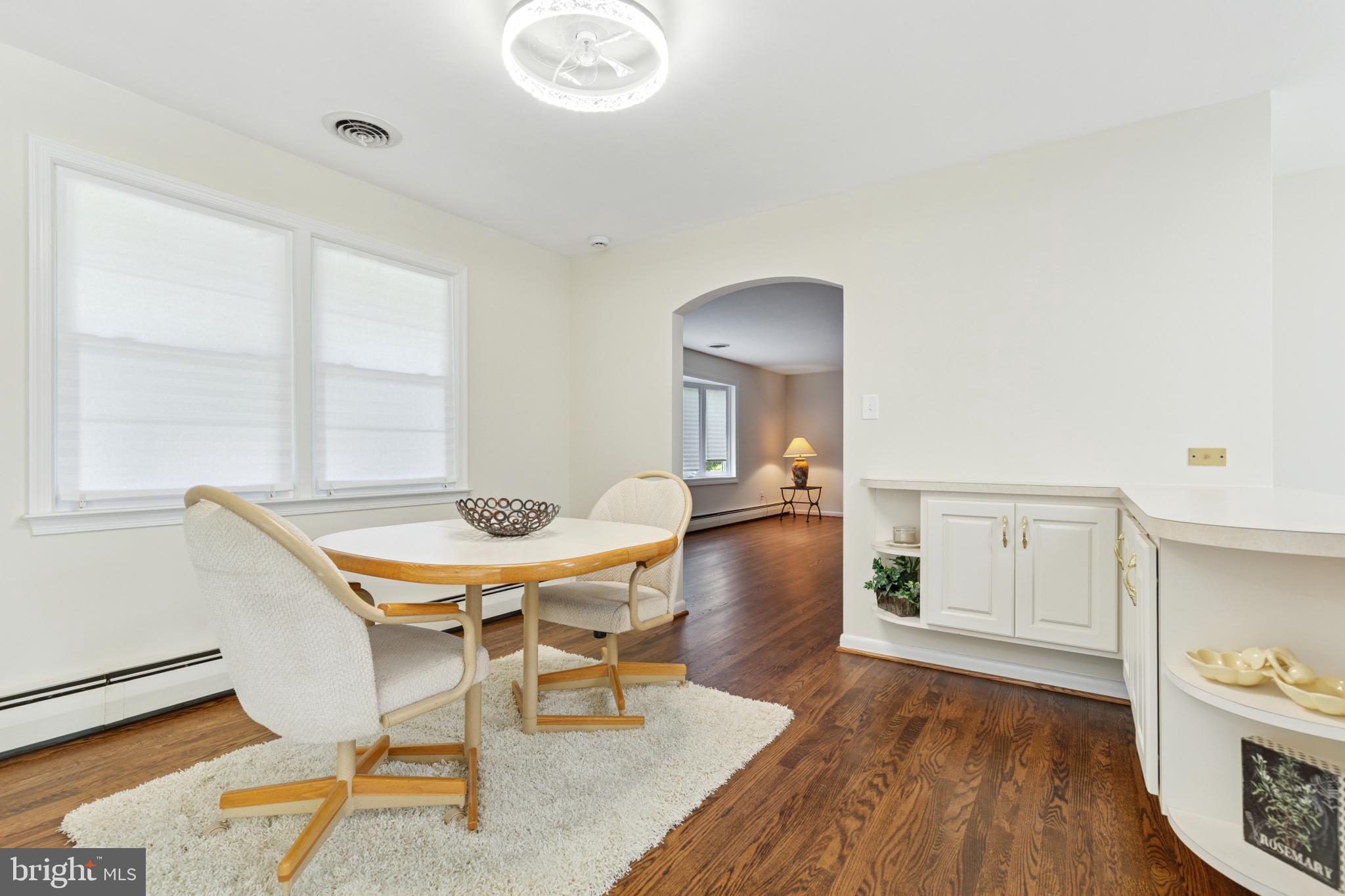 4009 High Point Road Ellicott City, MD 21042 - Photo 21 of 51 a view of a dining room with furniture and wooden floor
