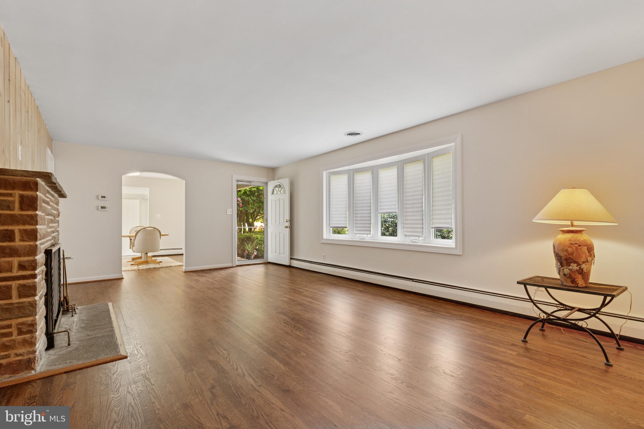 4009 High Point Road Ellicott City, MD 21042 - Photo 4 of 51 a view of livingroom with furniture wooden floor and window