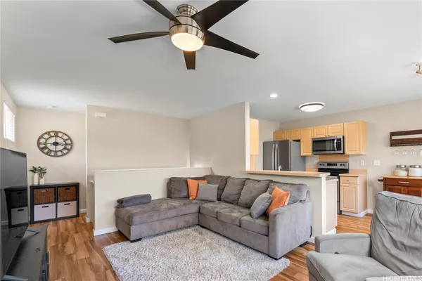 a view of a dining room with furniture and window