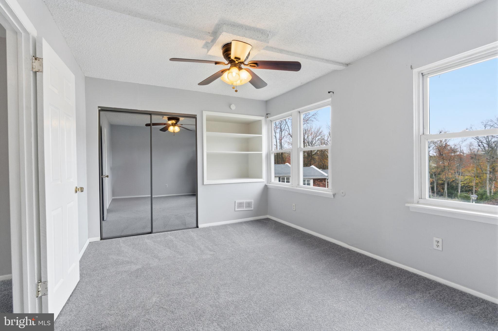 393 Rutgers Court Bensalem, PA 19020 - Photo 10 of 21 a view of an empty room with a window