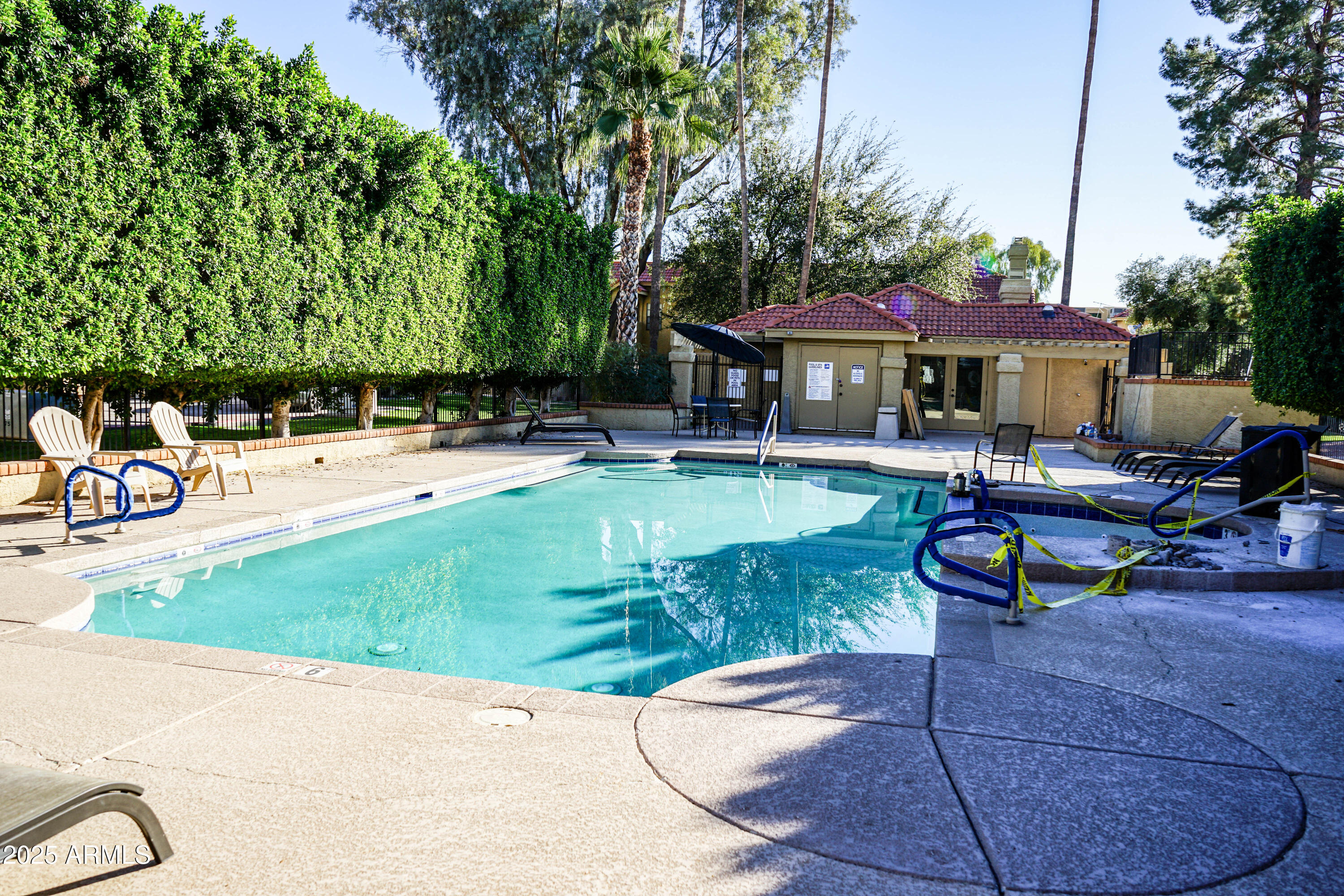 1126 West Elliot Road, Unit 1066 Chandler, AZ 85224 - Photo 5 of 21 an outdoor space with patio and white umbrellas