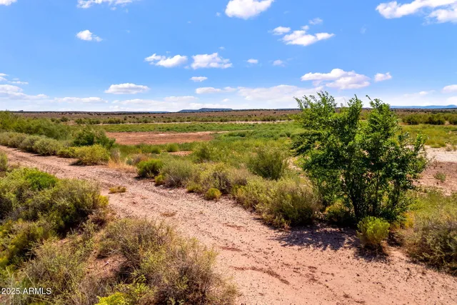 a view of mountains and valleys