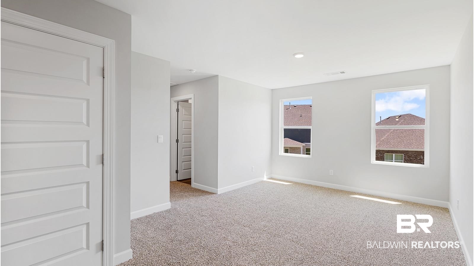 30567 Asheville Road Daphne, AL 36527 - Photo 23 of 29 Spare room with light carpet and recessed lighting