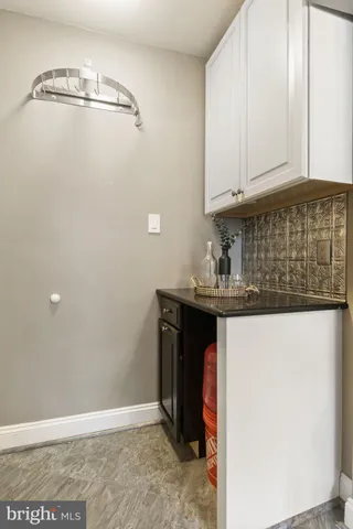 a white toilet sitting next to a bathroom sink