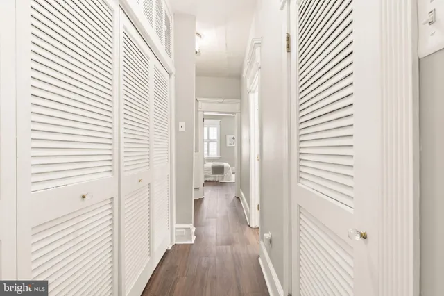 a bathroom with a shower sink and mirror
